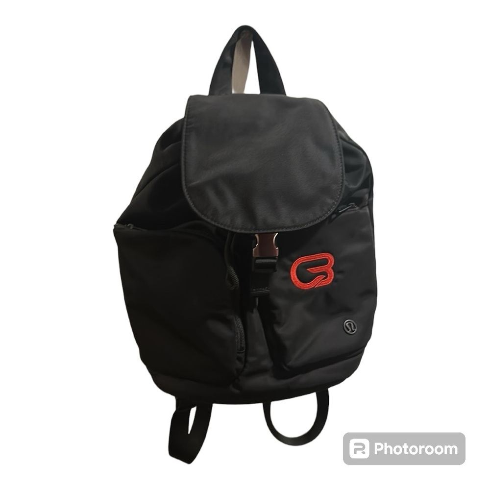 Lululemon black backpack purse red symbol on front pocket